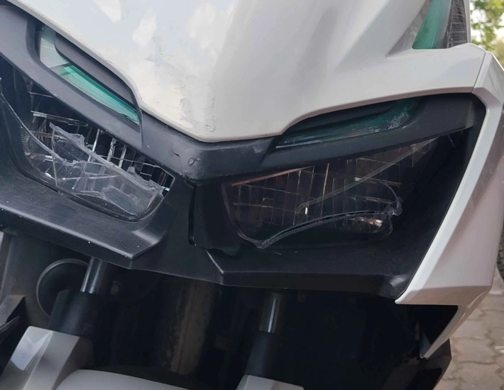 a smashed light unit on a scooter hub bike