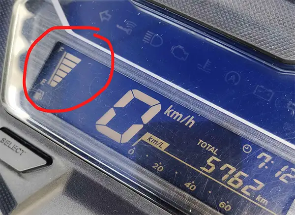 a photo of a full fuel gauge on a rental scooter