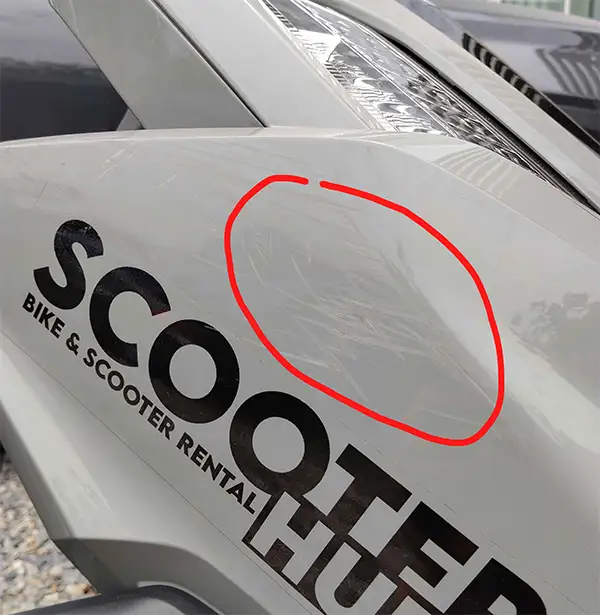 a photo of a scratched honda click 160