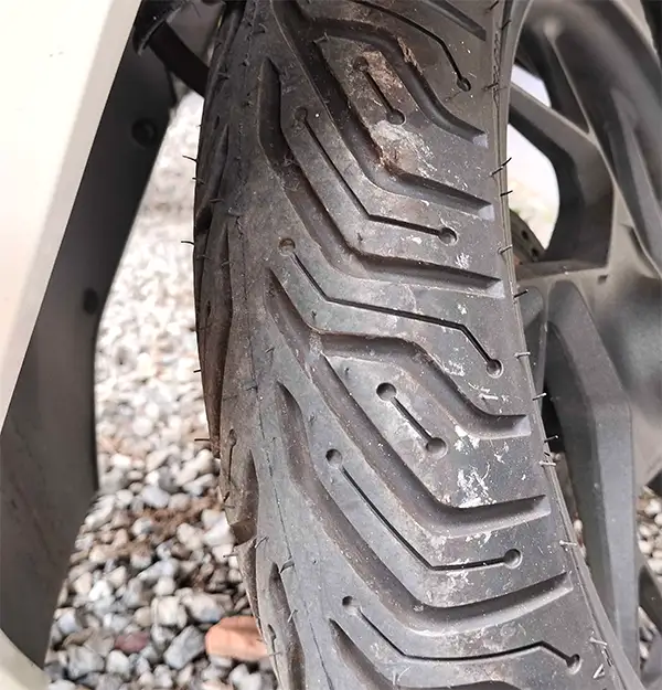 a photo of tire tread on a rental scooter